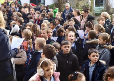 Schoolchildren bring festive cheer to care home
